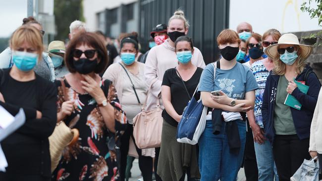 Residents from the area queue for testing at Wollongong Hospital on Wednesday. Picture: John Feder