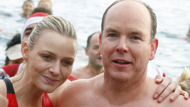 The couple pose as they bathe in the Mediterranean Sea in Monaco in 2009.