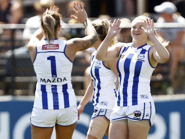 MELBOURNE, AUSTRALIA - FEBRUARY 12: Daria Bannister of North Melbourne celebrates a goal  during the round six AFLW match between the Richmond Tigers and the North Melbourne Kangaroos at Punt Road Oval on February 12, 2022 in Melbourne, Australia. (Photo by Darrian Traynor/Getty Images)