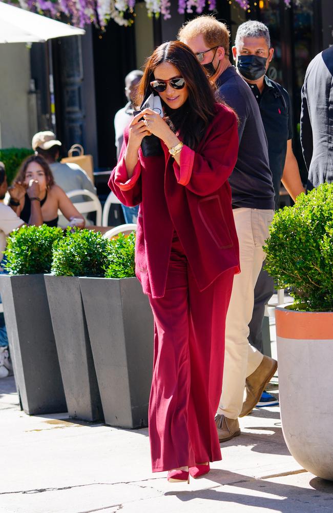 Meghan in that berry-coloured suit. Picture: Gotham/GC Images