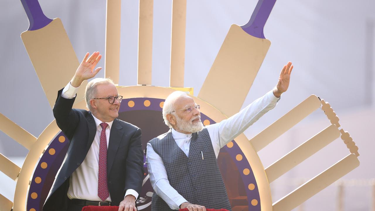 Australian Prime Minister Anthony Albanese and Indian Prime Minister Narendra Modi are seen on a lap of honour.