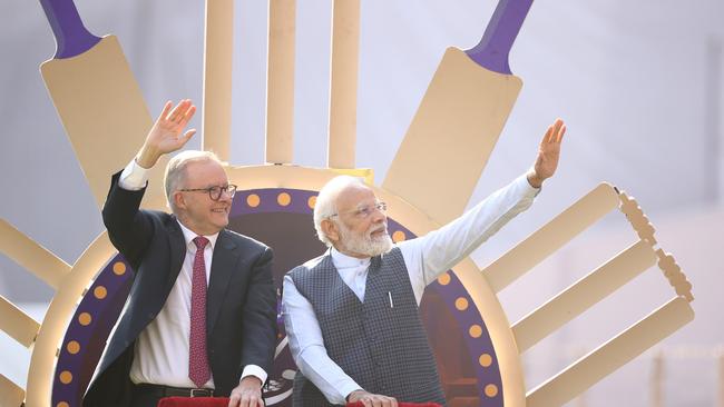 Australian Prime Minister Anthony Albanese and Indian Prime Minister Narendra Modi are seen on a lap of honour.