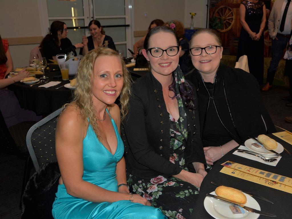 Brooke (L), Rebecca and Verushka (R) ready for a good night ahead at Warwick's Coppers Ball charity event on Saturday night.