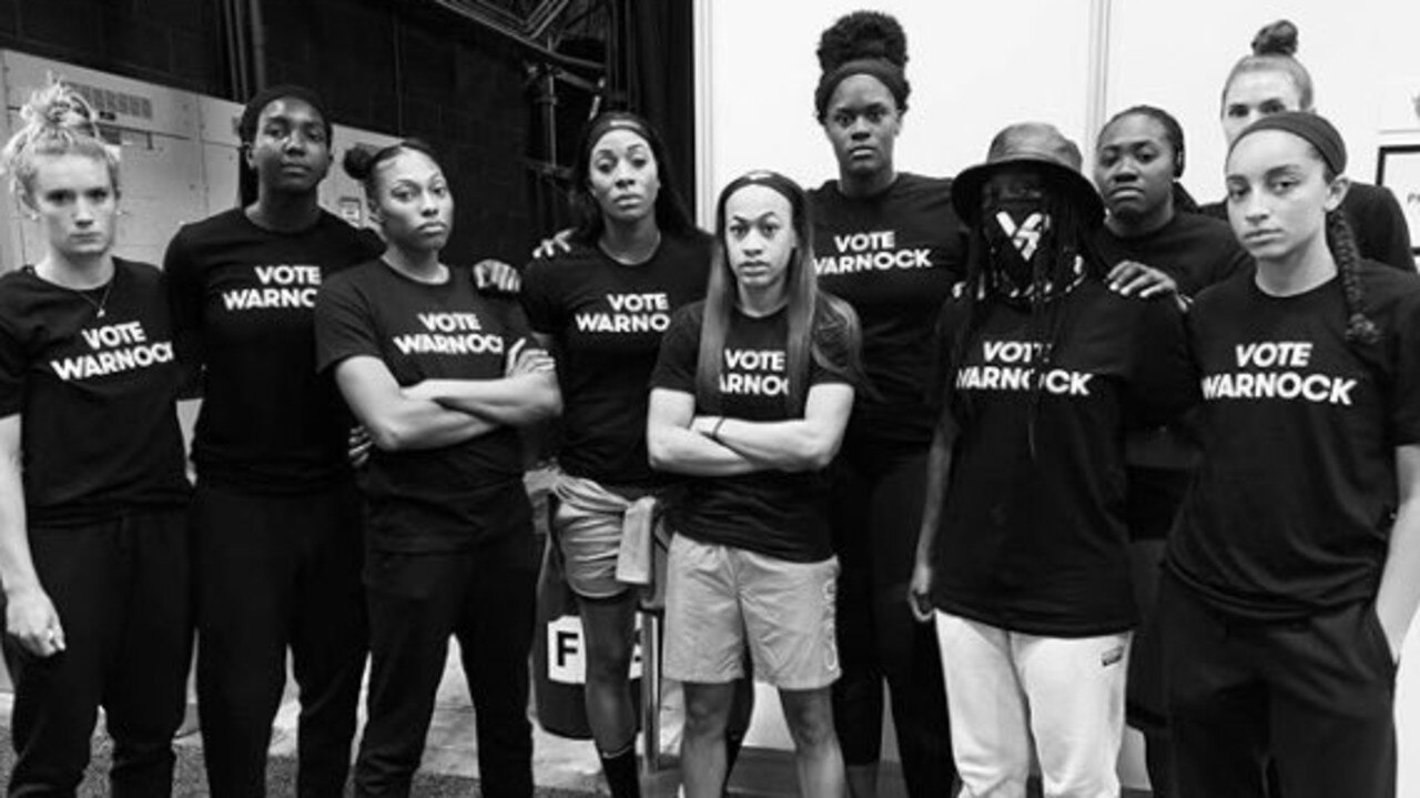 Atlanta Dream WNBA players wore 'Vote Warnock' shirts to support Kelly Loeffler's opponent Reverend Raphael Warnock before the US election.
