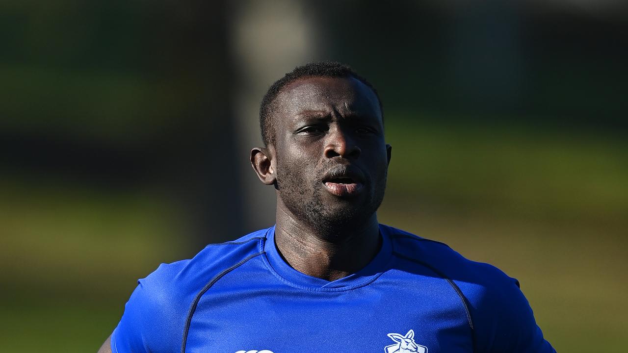 MELBOURNE, AUSTRALIA - MAY 26: Majak Daw of the Kangaroos runs laps during a North Melbourne Kangaroos AFL training session at Arden Street Ground on May 26, 2020 in Melbourne, Australia. (Photo by Quinn Rooney/Getty Images)