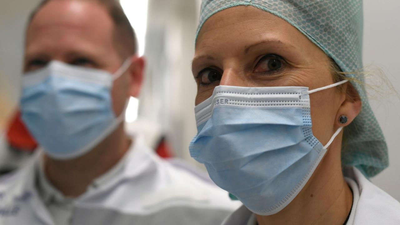 French doctors in surgical masks in a hospital in Germany. Picture: Ina Fassbender/AFP