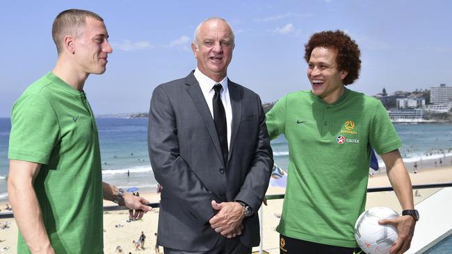 Socceroos head coach Graham Arnold, centre, with Alex Gersbach, left, and Mustafa Amini. Picture: AAP