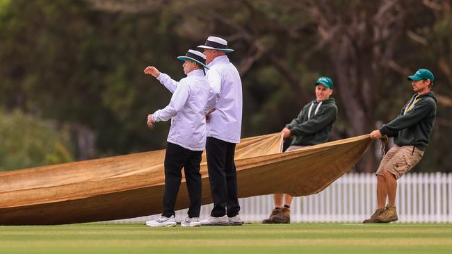 SYDNEY, AUSTRALIA - OCTOBER 08: The covers come on as rain delays play during the Sheffield Shield match between New South Wales and South Australia at Cricket Central, on October 08, 2024, in Sydney, Australia. (Photo by Mark Evans/Getty Images)