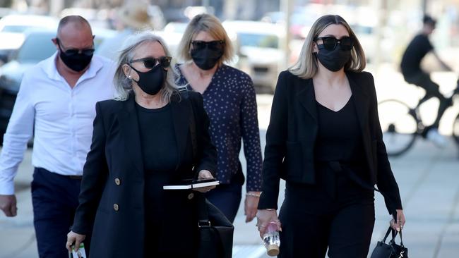 Lauren Jean Willgoose, right, arrives at the Adelaide Magistrates Court. Picture: NCA NewsWire / Kelly Barnes