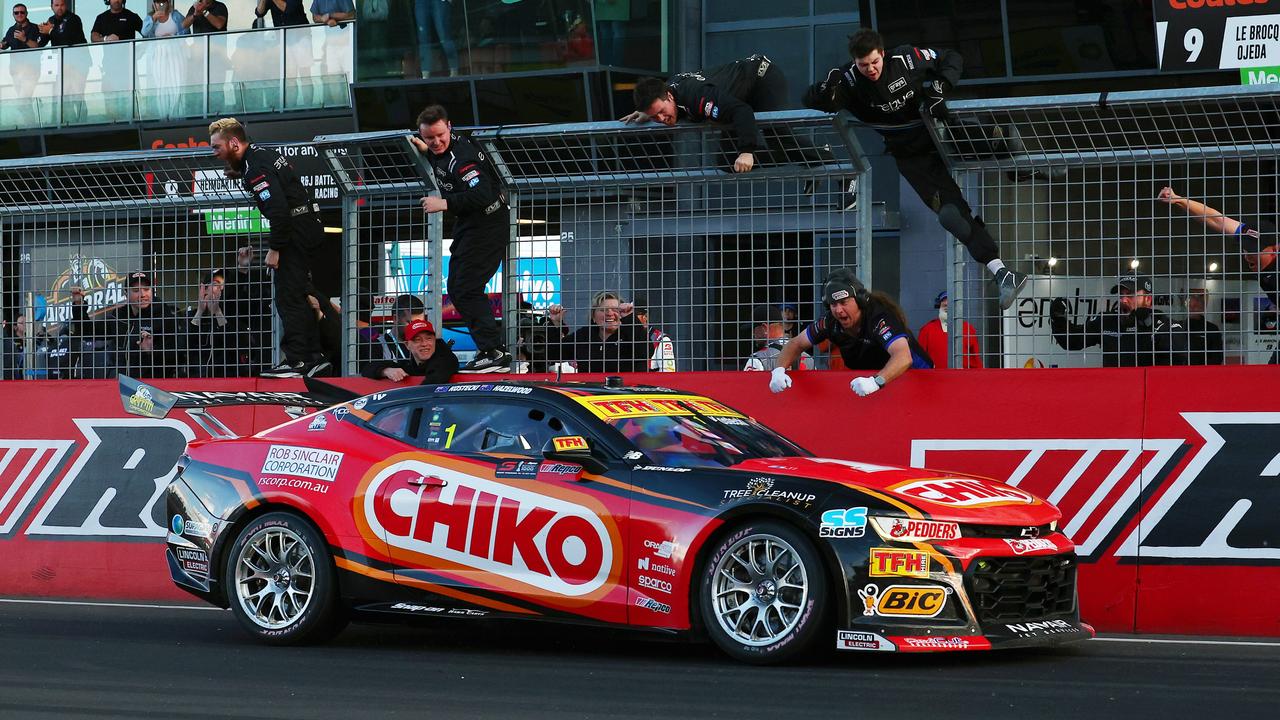 Erebus team members celebrate as Brodie Kostecki crosses the finish line at the 2024 Bathurst 1000. Picture: Getty Images