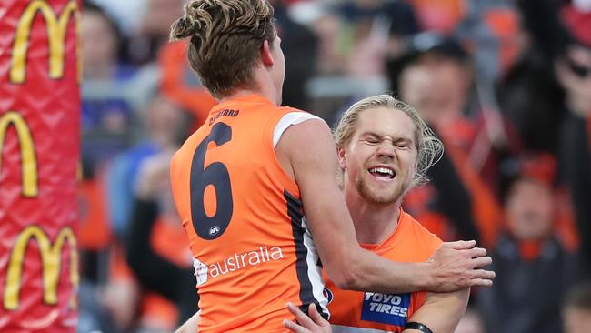 GWS players Harry Himmelberg and Lachie Whitfield celebrate a goal during their side’s commanding win over Western Bulldogs. Picture: Matt King/AFL Photos/via Getty Images.