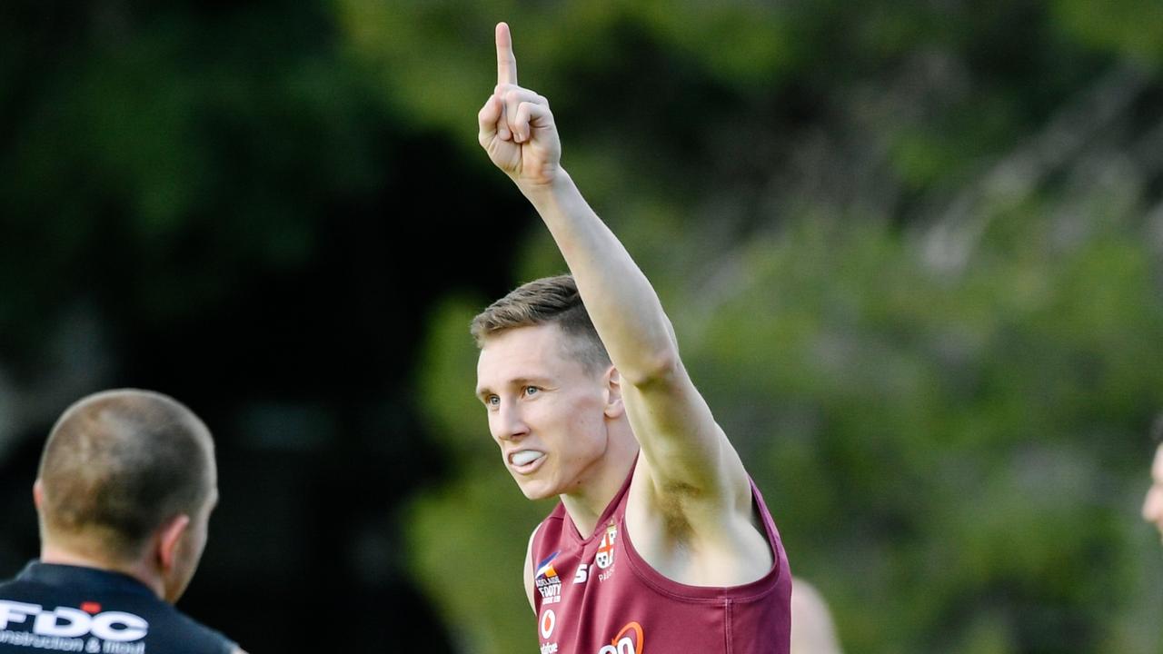 Jake Pitt pointing in the air after scoring a goal during the Adelaide Footy League match between Prince Alfred Old Collegians and Rostrevor Old Collegians on Saturday, June 22, 2019. (AAP Image/ Morgan Sette)