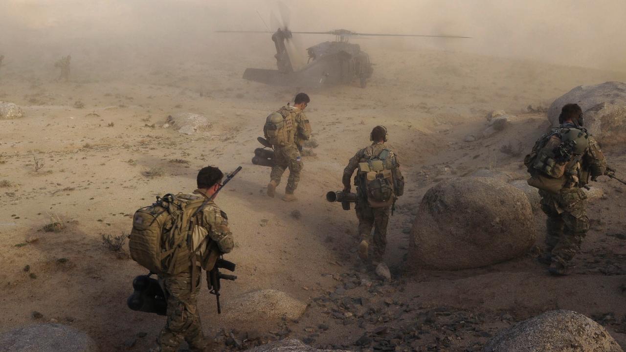 Special Operations Task Group SAS and Commandos make their way to a waiting UH-60 Blackhawk helicopter in Sha Wali Kot. Picture: Supplied