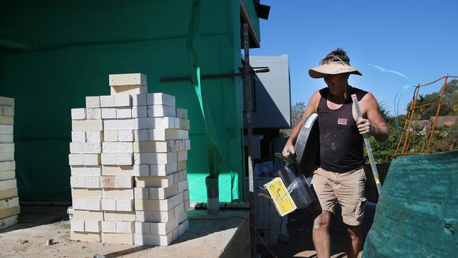 Some tradies are booked out until next year. Pictures: Jack Tran