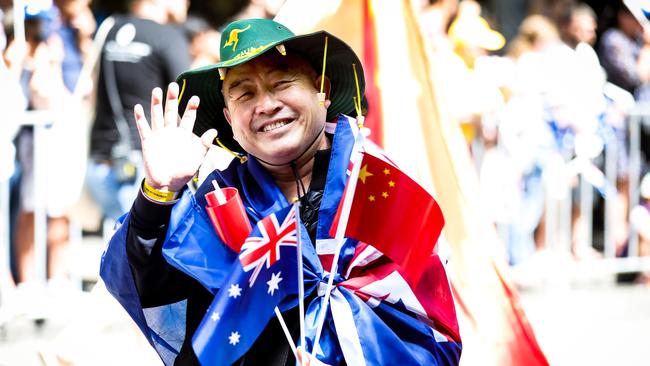 Members from the Chinese Community embracing the corked hat. Picture: Nicole Cleary