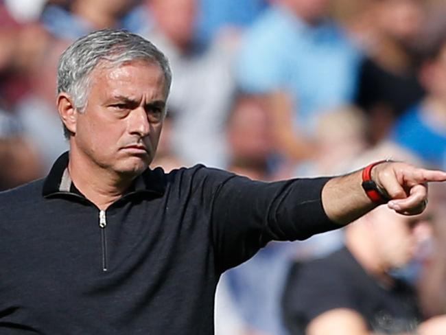 Manchester United's Portuguese manager Jose Mourinho gestures from the touchline during the English Premier League football match between West Ham United and Manchester United at The London Stadium, in east London on September 29, 2018. (Photo by Ian KINGTON / AFP) / RESTRICTED TO EDITORIAL USE. No use with unauthorized audio, video, data, fixture lists, club/league logos or 'live' services. Online in-match use limited to 120 images. An additional 40 images may be used in extra time. No video emulation. Social media in-match use limited to 120 images. An additional 40 images may be used in extra time. No use in betting publications, games or single club/league/player publications. /