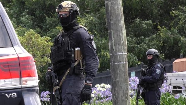 Police during a drug raid at Unanderra in December 2020. Picture: NSW Police
