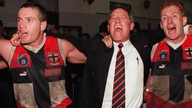 Stan Alves sings the clubs song with Rod Keogh and Jayson Daniels after the Saints beat North Melbourne to reach the 1997 Grand Final.