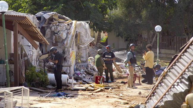 The aftermath of a Hamas terror attack on the village of Kfar Aza.