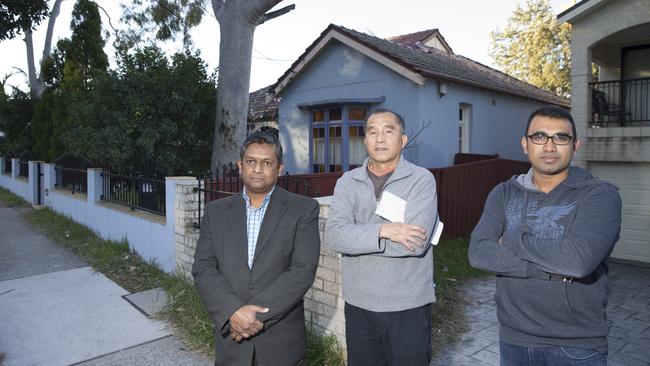 Colin St, Lakemba residents Reaz Hyder, Duncan Nguyen, Newaz Parvez were happy that Canterbury-Bankstown Council refused an application for a three-storey boarding house in their street back in August. Picture: Melvyn Knipe