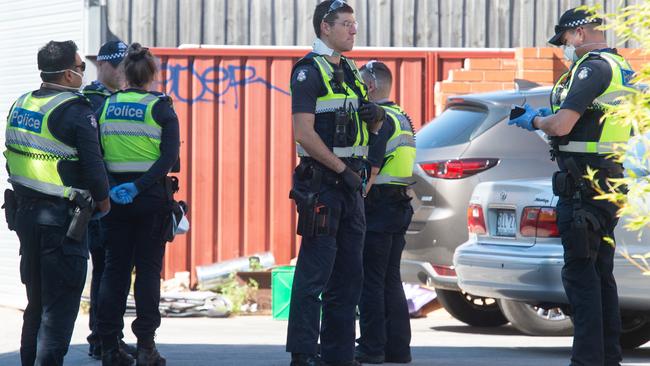 Police fine members of a Jewish Synagogue that have broken the Social distancing rule in Glen Eira road, Ripponlea. Picture: Tony Gough