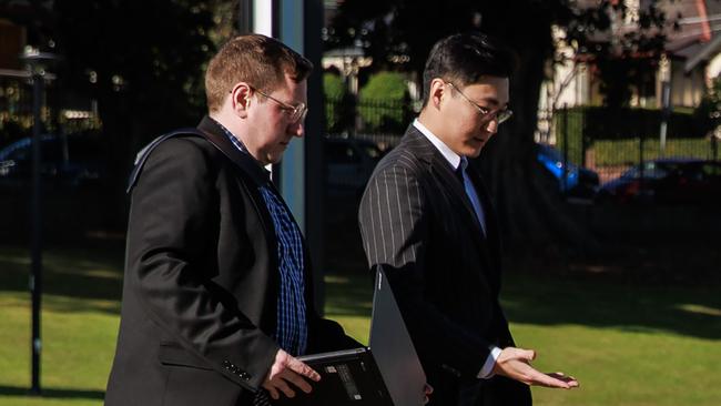 Daily Telegraph. 17, July, 2023. Luke Coppin, left, manager of DVT GROUP, arrives at the first meeting of creditors after the collapse of, Toplace, at Drummoyne Oval, today. Picture: Justin Lloyd.