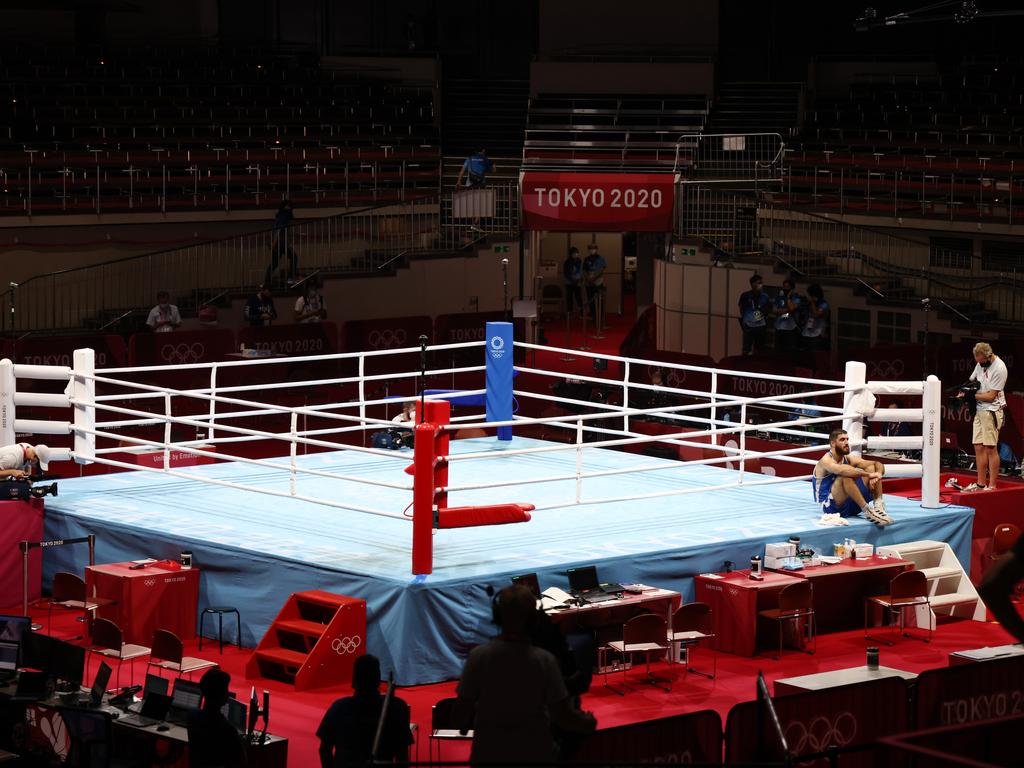 France's Mourad Aliev refuses to leave the ring.