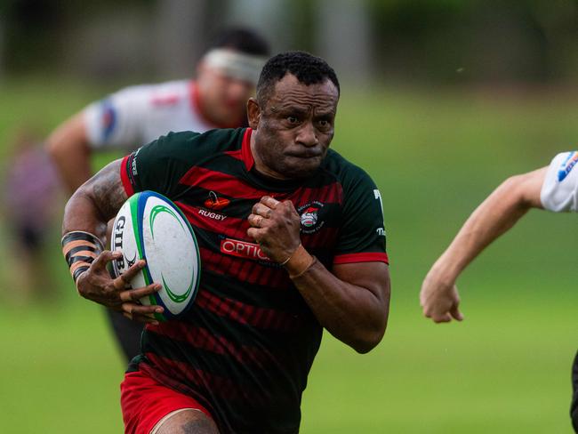 South Darwin’s Stefano Cakaunivalu goes on a run before passing for a Bunnies try. Picture: Che Chorley