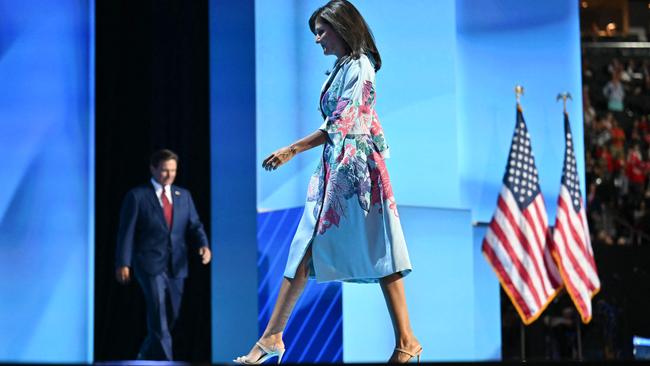 For a brief moment, Nikki Haley and Ron Desantis share the stage: the former ambassador to the United Nations and South Carolina Governor walks off stage after speaking as the Florida Governor Ron DeSantis steps on, on the second day of the 2024 Republican National Convention.