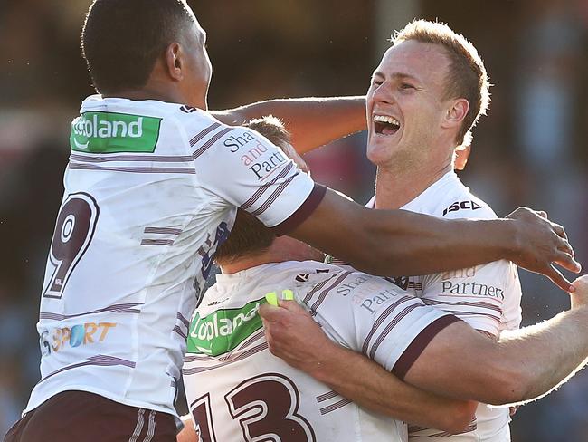 SYDNEY, AUSTRALIA - AUGUST 05:  Daly Cherry-Evans of the Sea Eagles celebrates with team mates after kicking a golden point in extra time to win the round 21 NRL match between the Cronulla Sharks and the Manly Sea Eagles at Southern Cross Group Stadium on August 5, 2018 in Sydney, Australia.  (Photo by Mark Metcalfe/Getty Images)