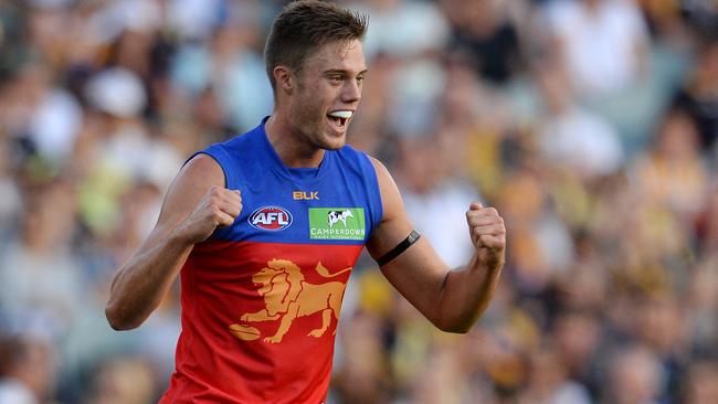 Josh Schache celebrates a Brisbane goal.