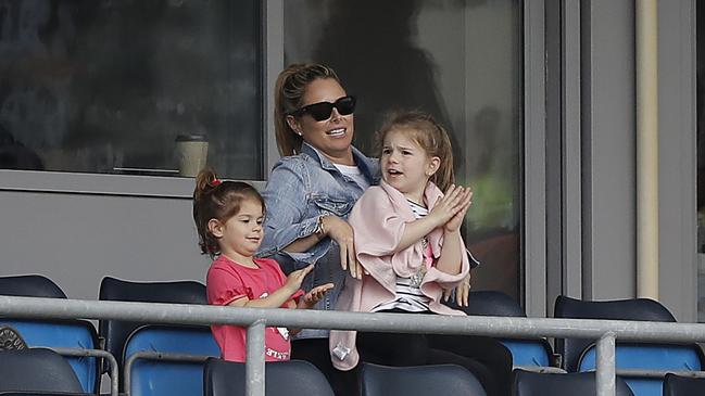 Candice Warner, wife of David Warner of Australia, and their daughters Ivy and Indi look on during Day One of the 3rd Ashes Test match.