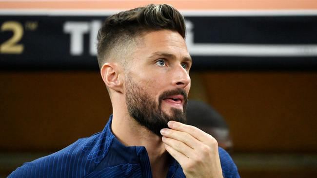 Olivier Giroud of France looks dejected.