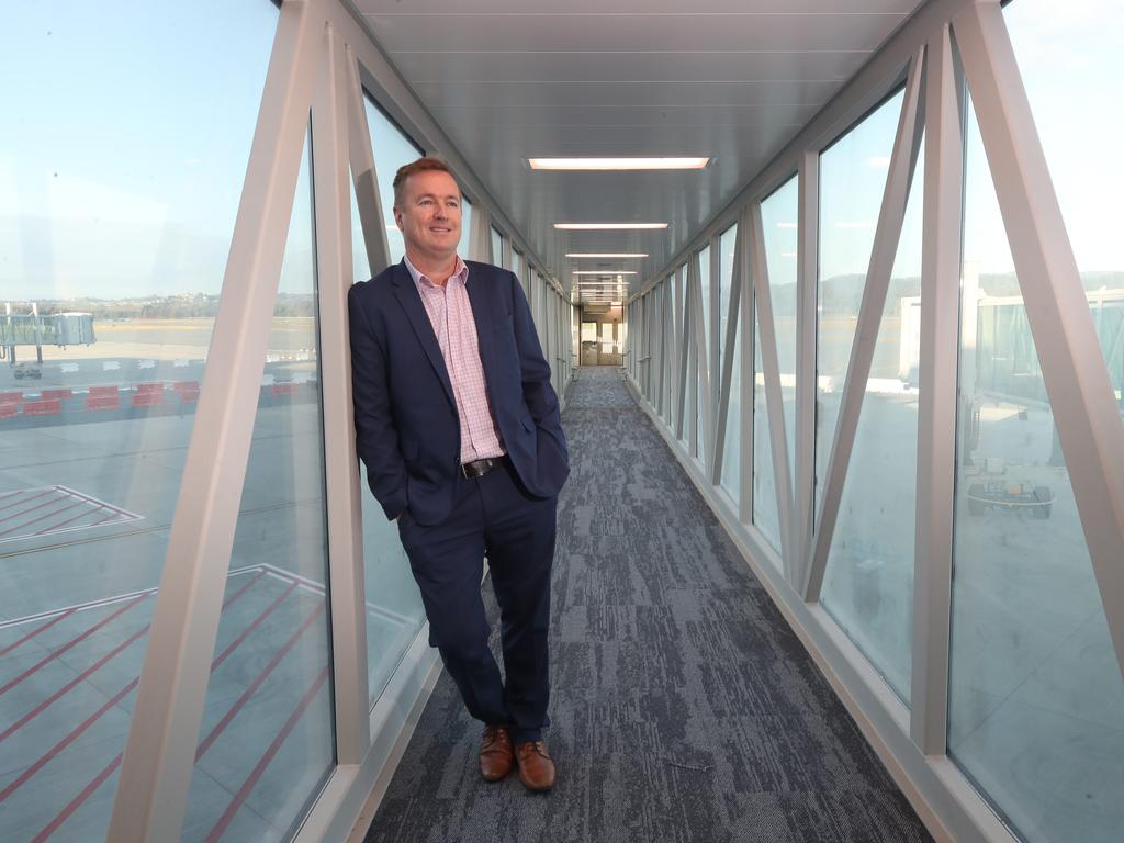 Queensland Airports Limited CEO Chris Mills at one of the new aerobridges. Picture: Glenn Hampson.