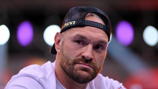 Tyson Fury says he is proud of his fightback from dark thoughts to win a world title.