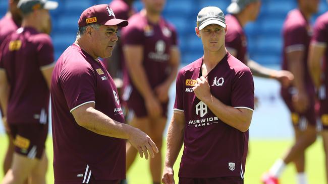 Kangaroos coach Mal Meninga, pictured chatting with Daly Cherry-Evans, doesn’t think Jarome Luai and Junior Paulo should play Origin. Picure: Chris Hyde/Getty Images