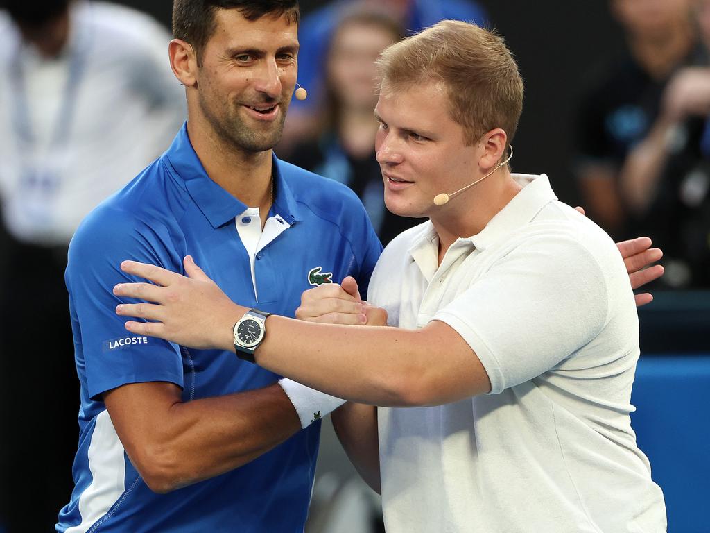 Novak Djokovic and Jackson Warne in January last year. Picture: Mark Stewart