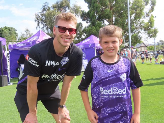 Hurricanes fan Kruize Moy with player Riley Meredith at Tuesday's fan day in Launceston. Picture: Jon Tuxworth