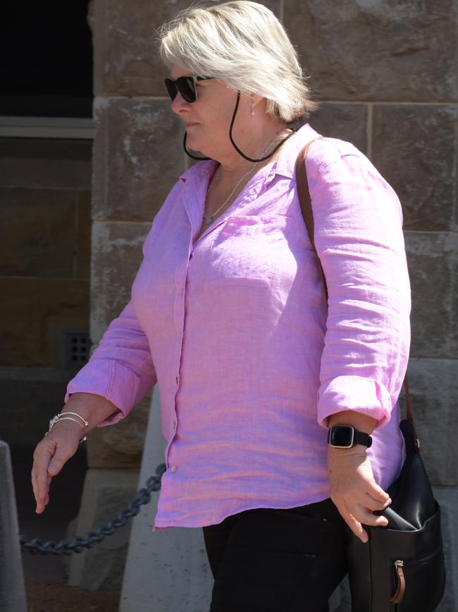 One of the women seen appearing at court alongside Mr Burdon, joining him as he left the hearing. Picture: NCA NewsWire / Sharon Smith