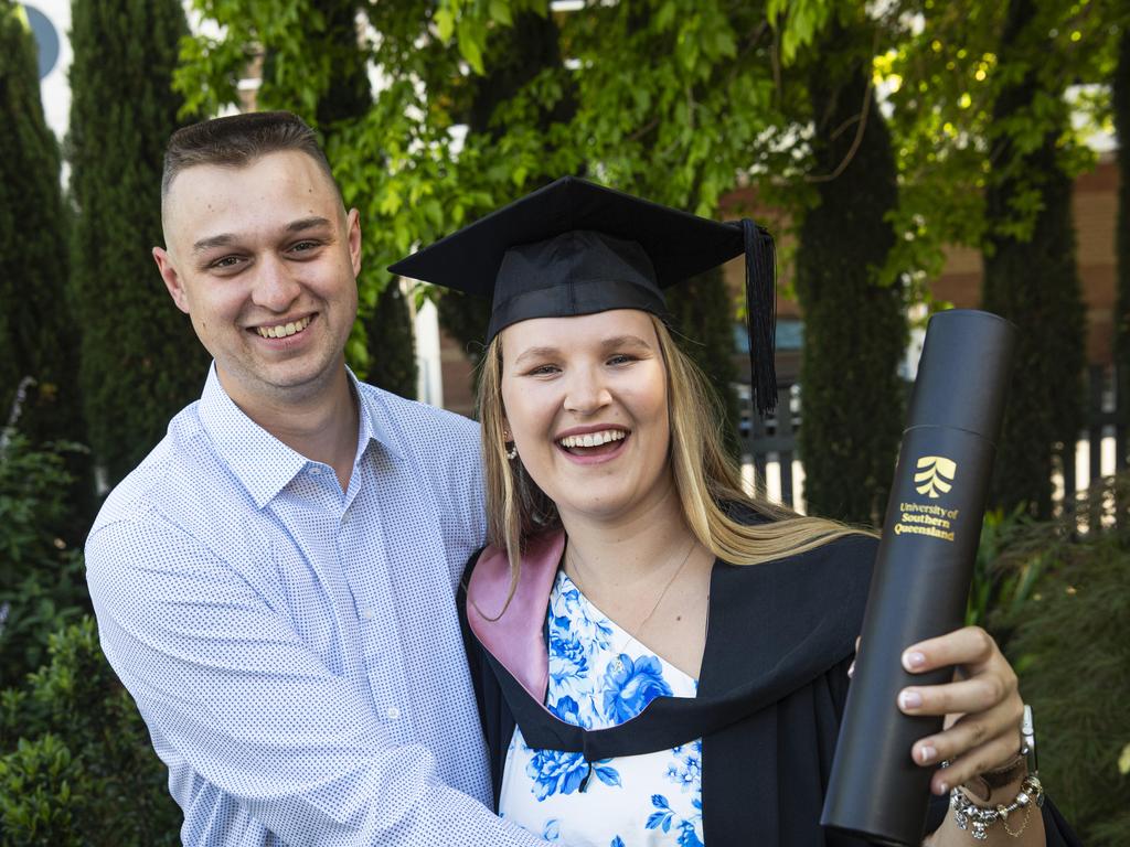 Bachelor of Education (Primary) graduate Jessica Brierley celebrates with Ben Duffield at a UniSQ graduation ceremony at The Empire, Tuesday, October 29, 2024. Picture: Kevin Farmer