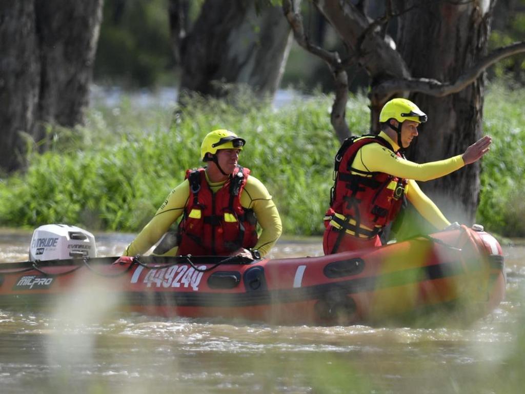 Energency services personnel hunt for the missing vehicle. Photo: Kevin-John Farmer