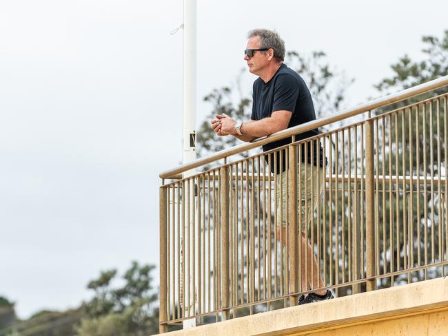 David Rose endured a heartbreaking vigil at Mount Martha Life Saving Club as police divers searched for the bodies of his son James pilot Stephen Gale. Picture: Jake Nowakowski