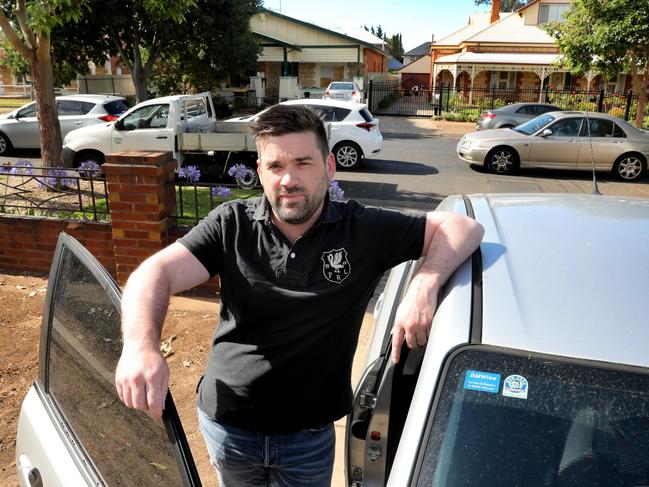 We have received complaints from residents on Goodenough street, Mile End,  about the continuous line up of cars for the testing station at all hours of the day. Local resident Nick Rogers, at about 9.20am. He is increasingly frustrated trying to get in and out of his driveway. 15 December 2021. Picture Dean Martin