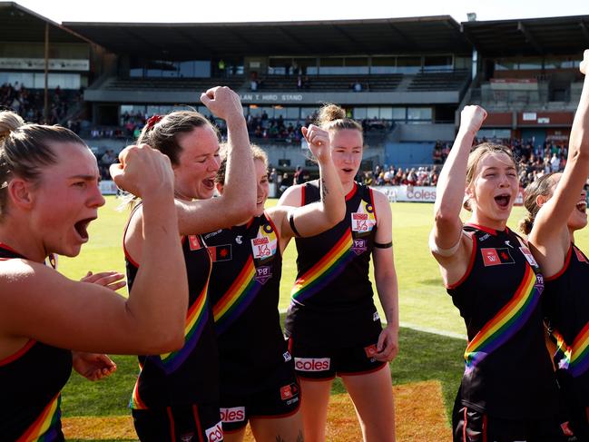 MELBOURNE, AUSTRALIA - OCTOBER 28: Bombers players celebrate during the 2023 AFLW Round 09 match between The Essendon Bombers and The Carlton Blues at Windy Hill on October 28, 2023 in Melbourne, Australia. (Photo by Michael Willson/AFL Photos via Getty Images)