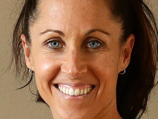 Sally Brouwer working out at home in Sunnybank Hills. Sally is a mother of 5 year-old triplets and is encouraging new mums to get fit. Photographer: Liam Kidston.