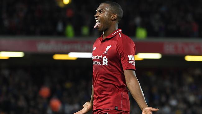 Liverpool's English striker Daniel Sturridge celebrates scoring the opening goal during the English League Cup third round football match between Liverpool and Chelsea at Anfield in Liverpool, north west England on September 26, 2018. (Photo by Paul ELLIS / AFP) / RESTRICTED TO EDITORIAL USE. No use with unauthorized audio, video, data, fixture lists, club/league logos or 'live' services. Online in-match use limited to 120 images. An additional 40 images may be used in extra time. No video emulation. Social media in-match use limited to 120 images. An additional 40 images may be used in extra time. No use in betting publications, games or single club/league/player publications. /