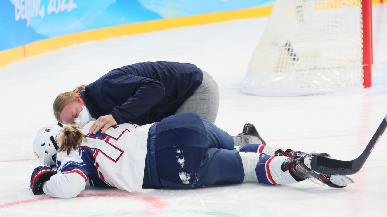 Brianna Decker of Team United States goes down injured. Photo by Bruce Bennett/Getty Images.