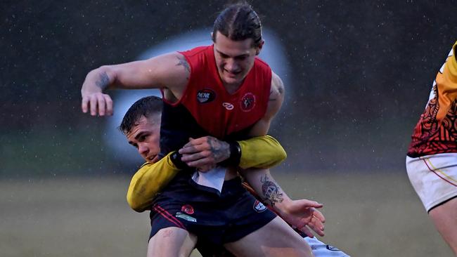 Oliver Stapleton is tackled by Kain Proctor. Picture: Andy Brownbill