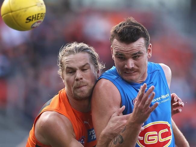 SYDNEY, AUSTRALIA - APRIL 02: HarryÃÂ Himmelberg of the Giants and Caleb Graham of the Suns contest the ball during the round three AFL match between the Greater Western Sydney Giants and the Gold Coast Suns at GIANTS Stadium on April 02, 2022 in Sydney, Australia. (Photo by Cameron Spencer/Getty Images)