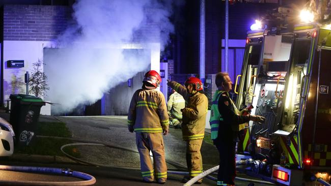 Firefighters at the scene of the suspicious fire at Mount St, Coogee. Picture: Bill Hearne